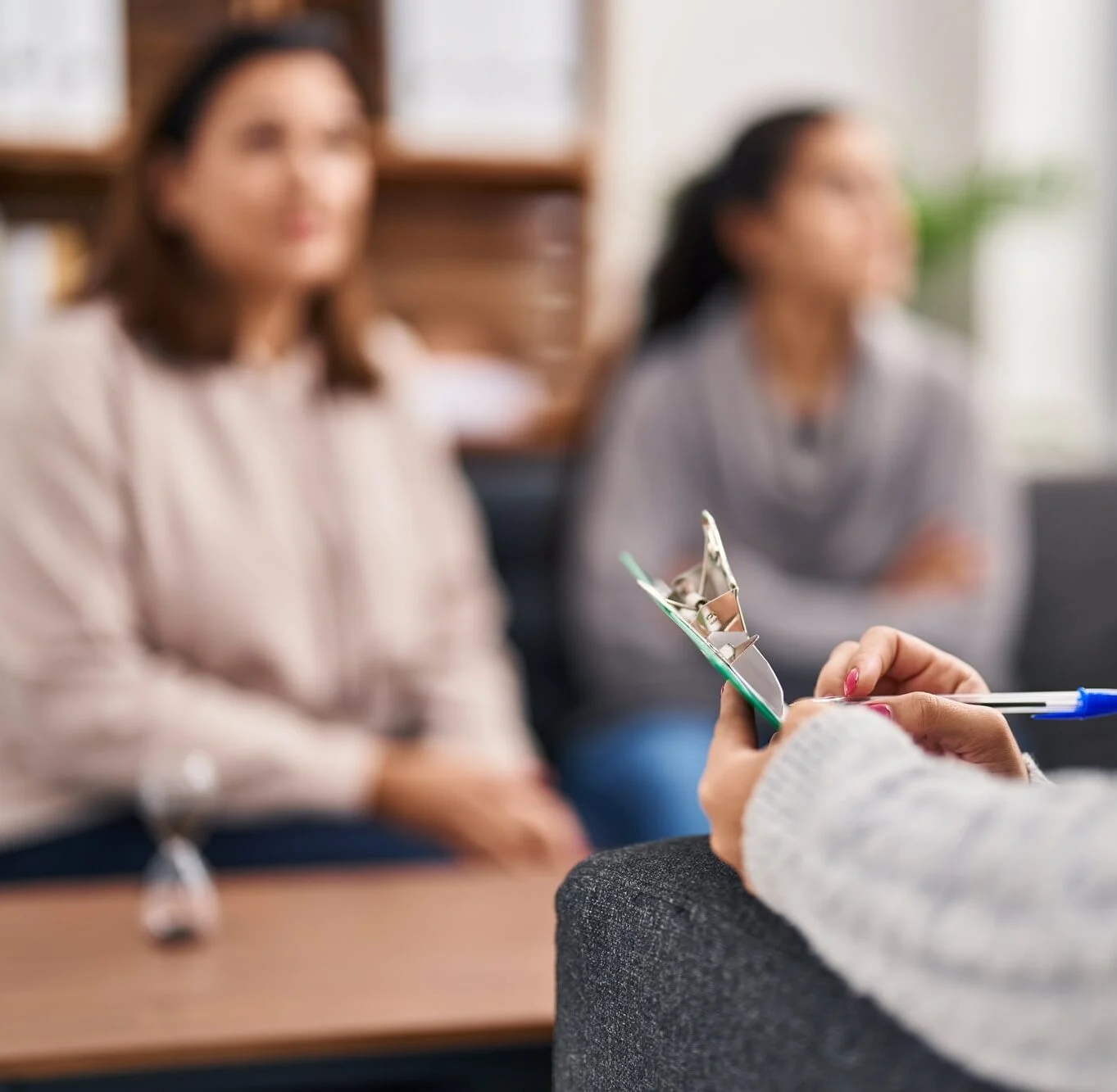 Mother and daughter having family therapy